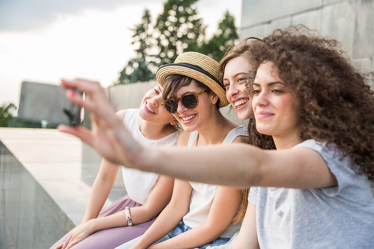 Four Happy Girlfriends Taking A Selfie Spring Season By Stocksy Contributor Jovo Jovanovic 6301