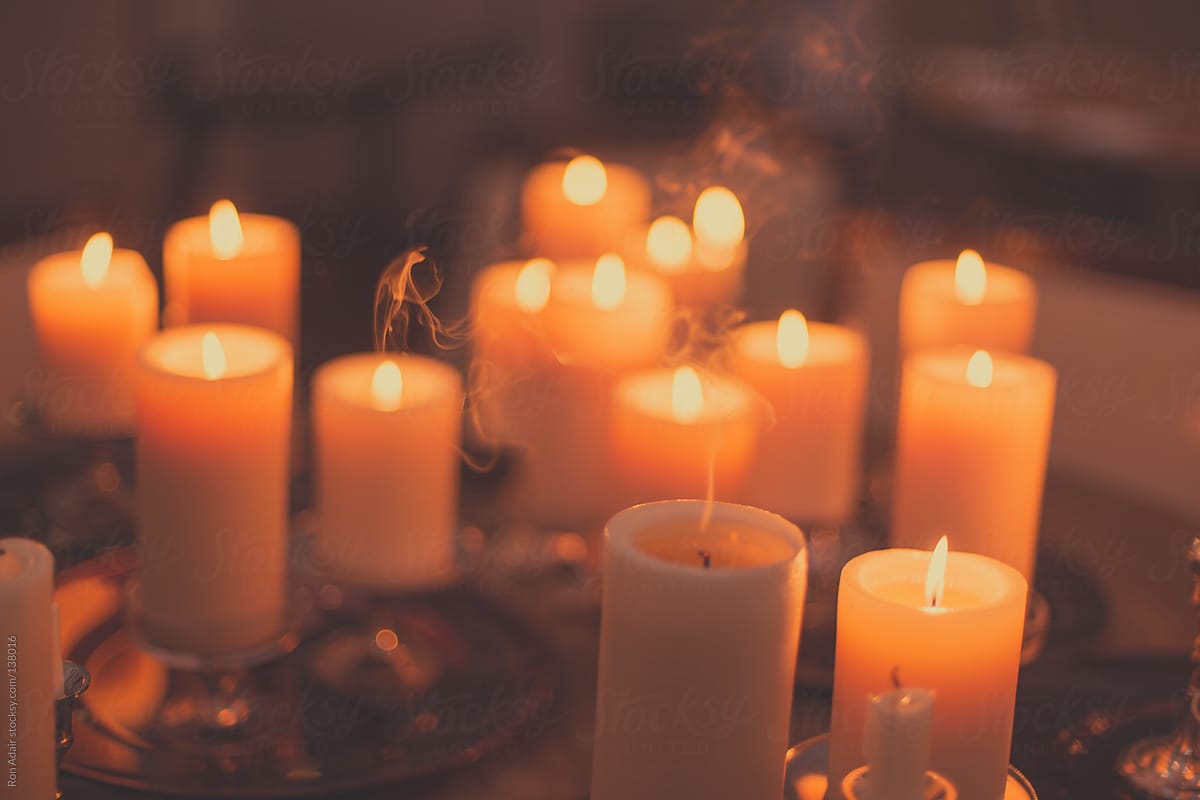 Candles Lit on Antique Table at a Wedding