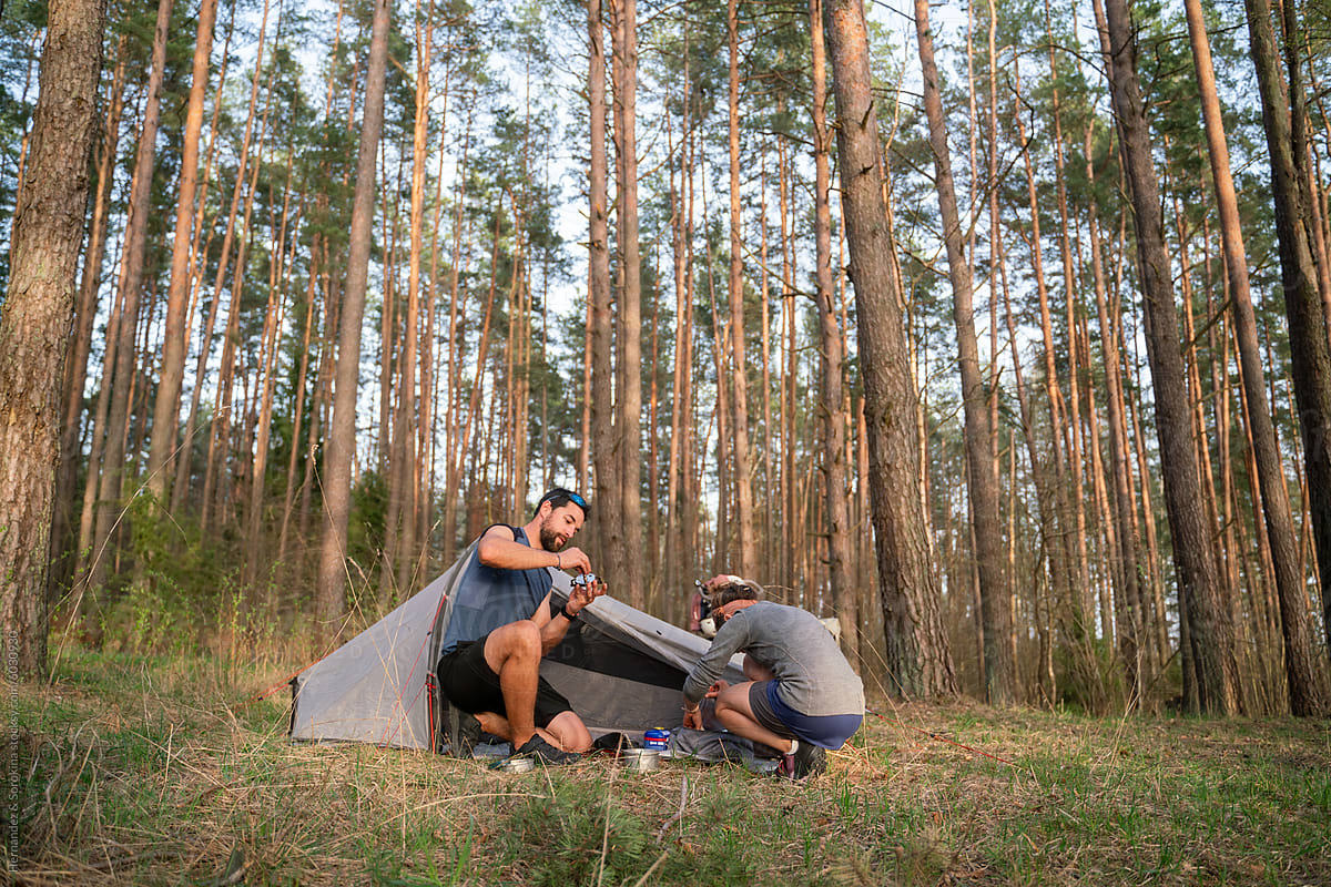 Couple Enjoying Camping Adventure In The Nature