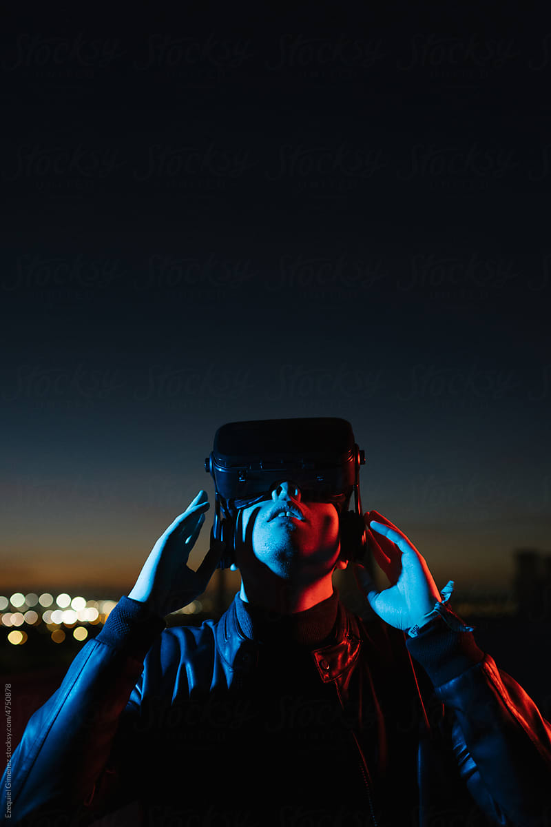 Man in VR glasses looking up
