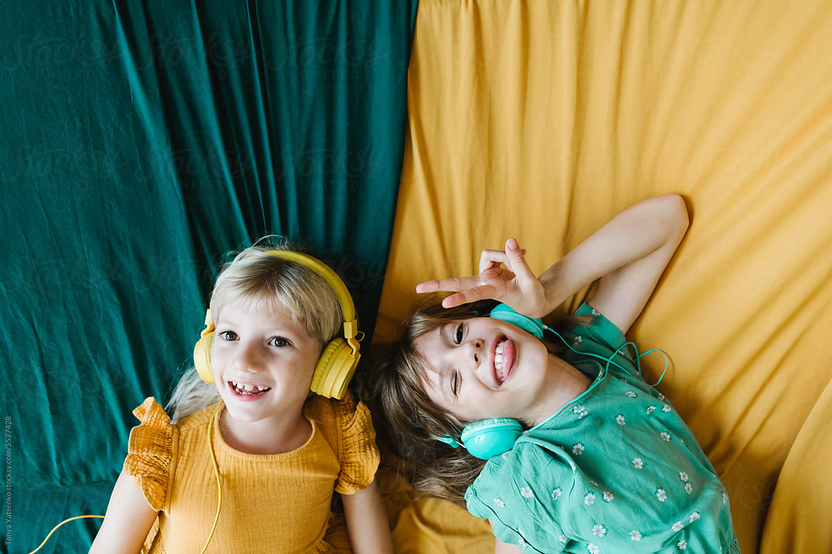 Two girls listening to music