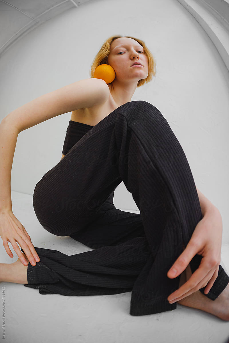 Impressive Woman Posing With Orange  Unusual Wide Ungle