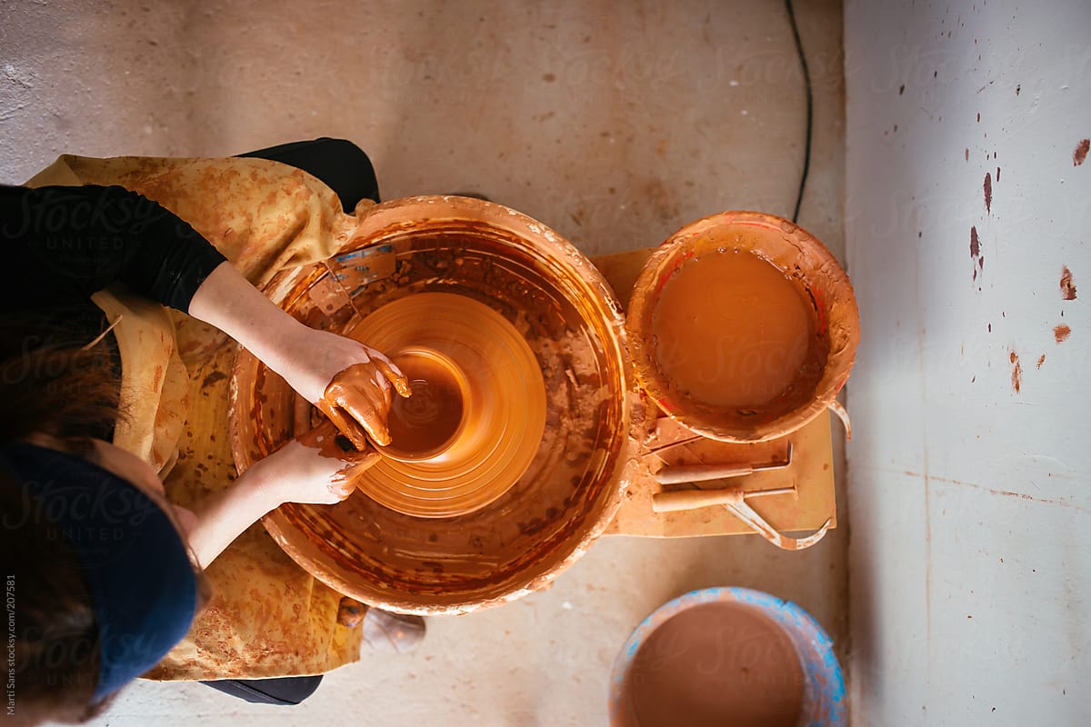 Pottery wheel and clay vase