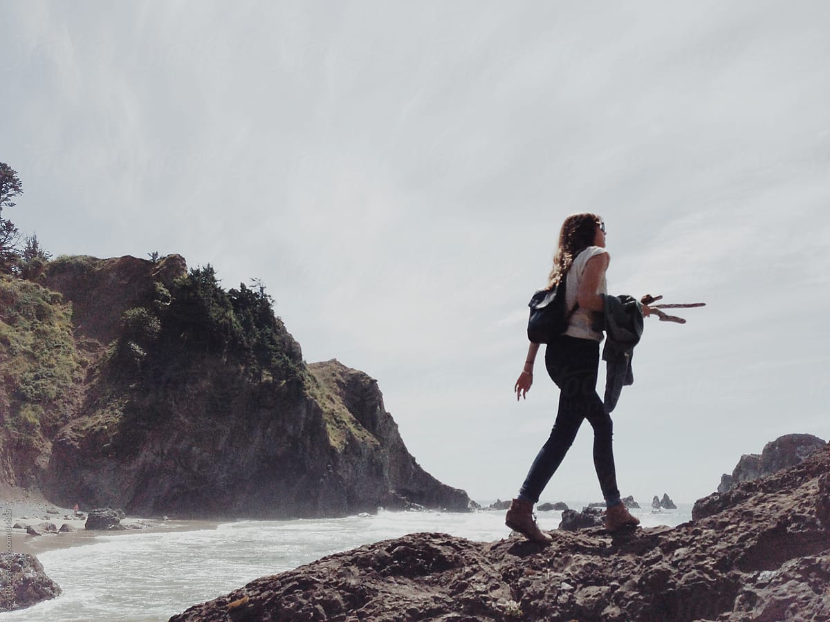 Woman Walking On Coast Cliff Del Colaborador De Stocksy Kevin Russ Stocksy