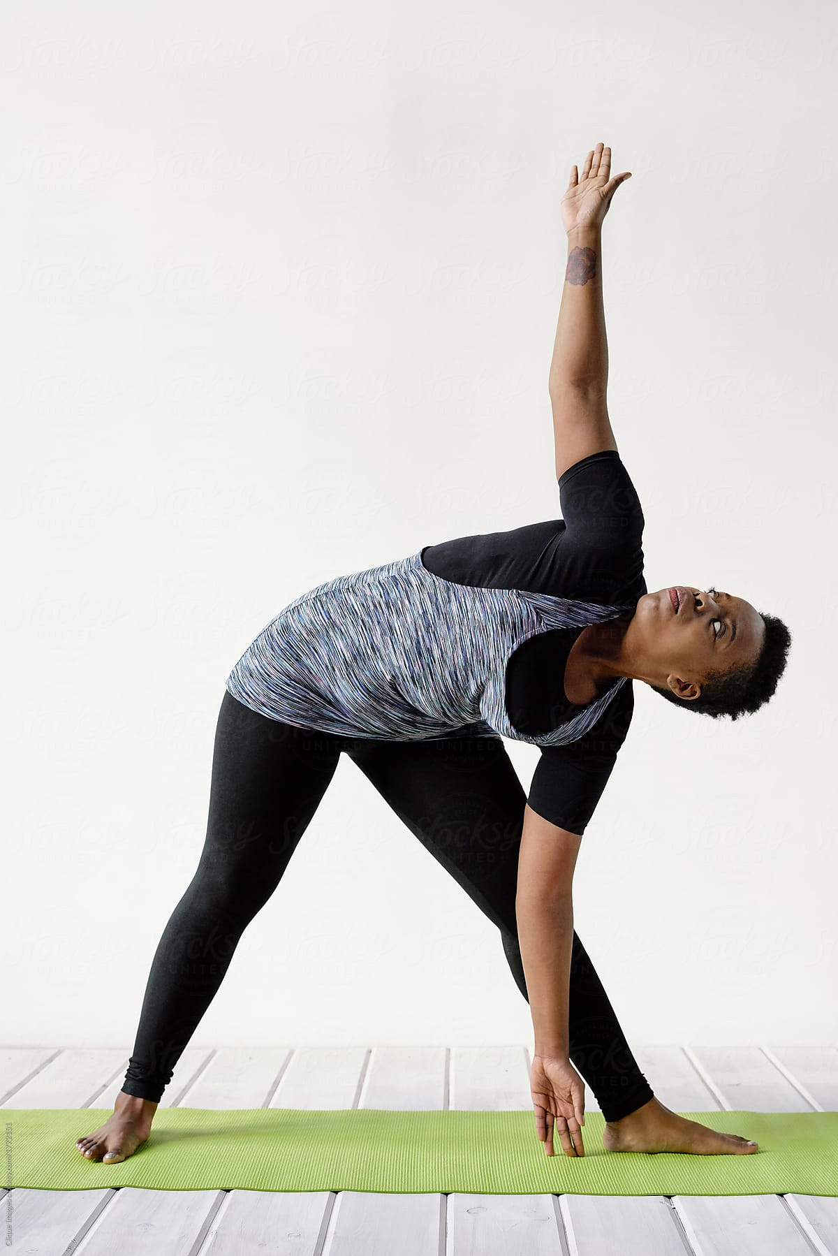 African American woman doing yoga