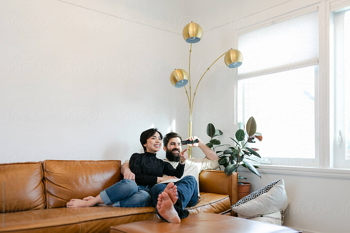 Couple Watching TV in Living Room