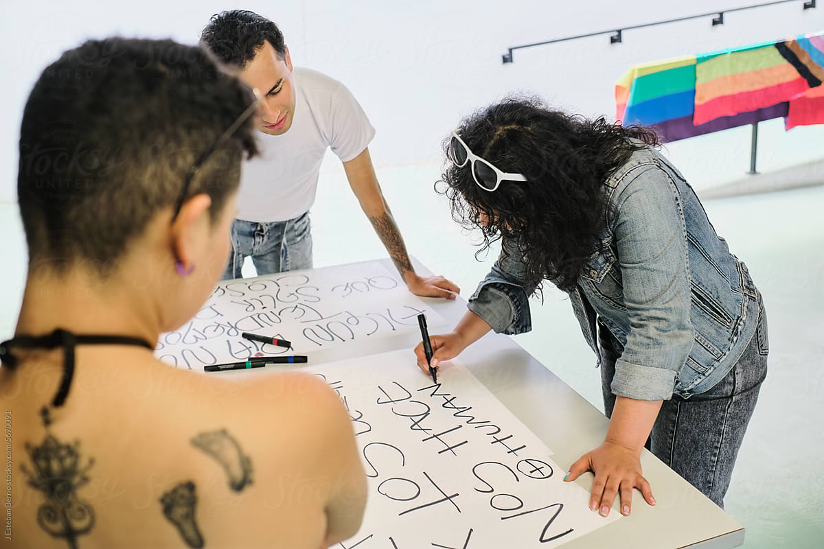 LGBT people writing protest phrases