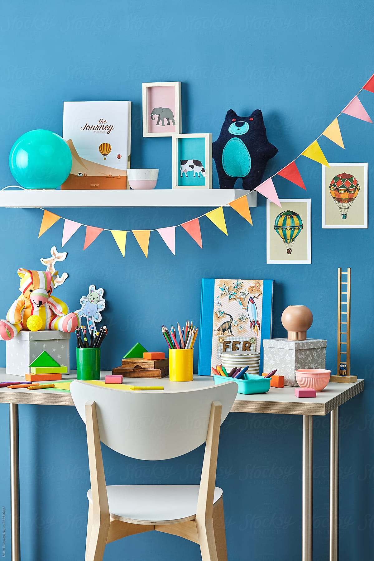 Beautiful modern kid\'s desk with decorations.