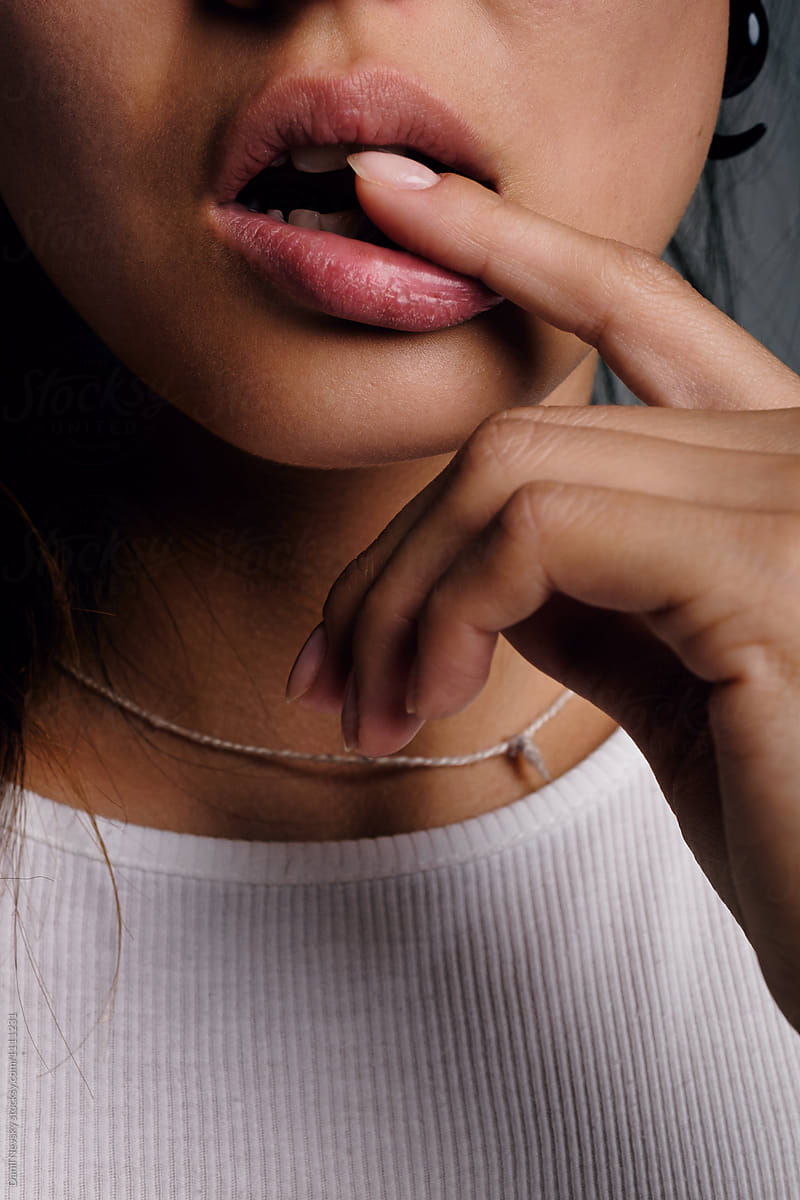 Close Up Of Girl With Finger On Lips By Danil Nevsky