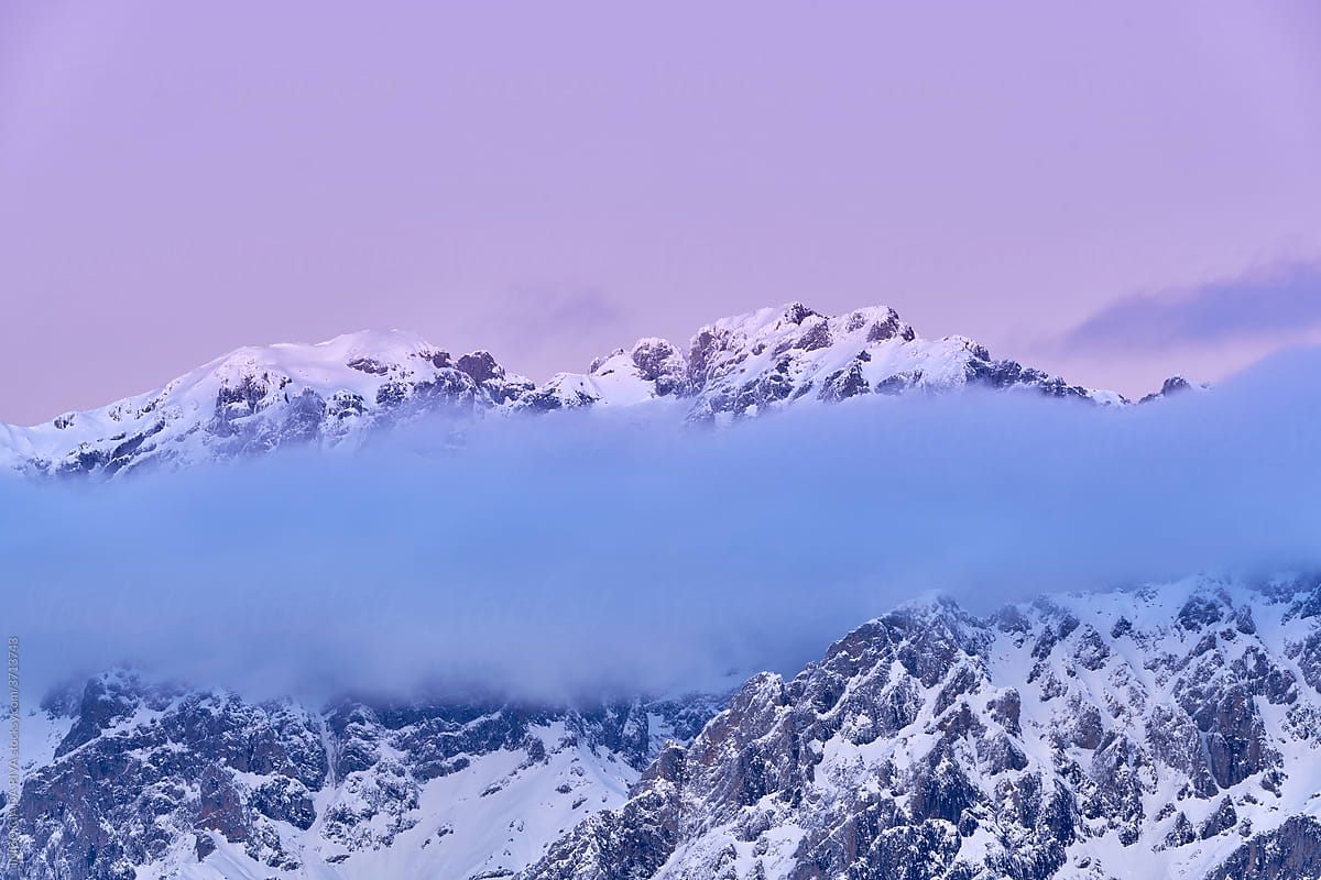 Severe Landscape With Snowy Rocky Mountain Peak