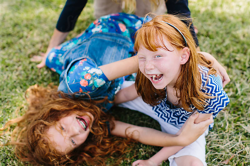 Two Adorable Red Headed Sisters Having Fun Outdoors By Kristen Curette