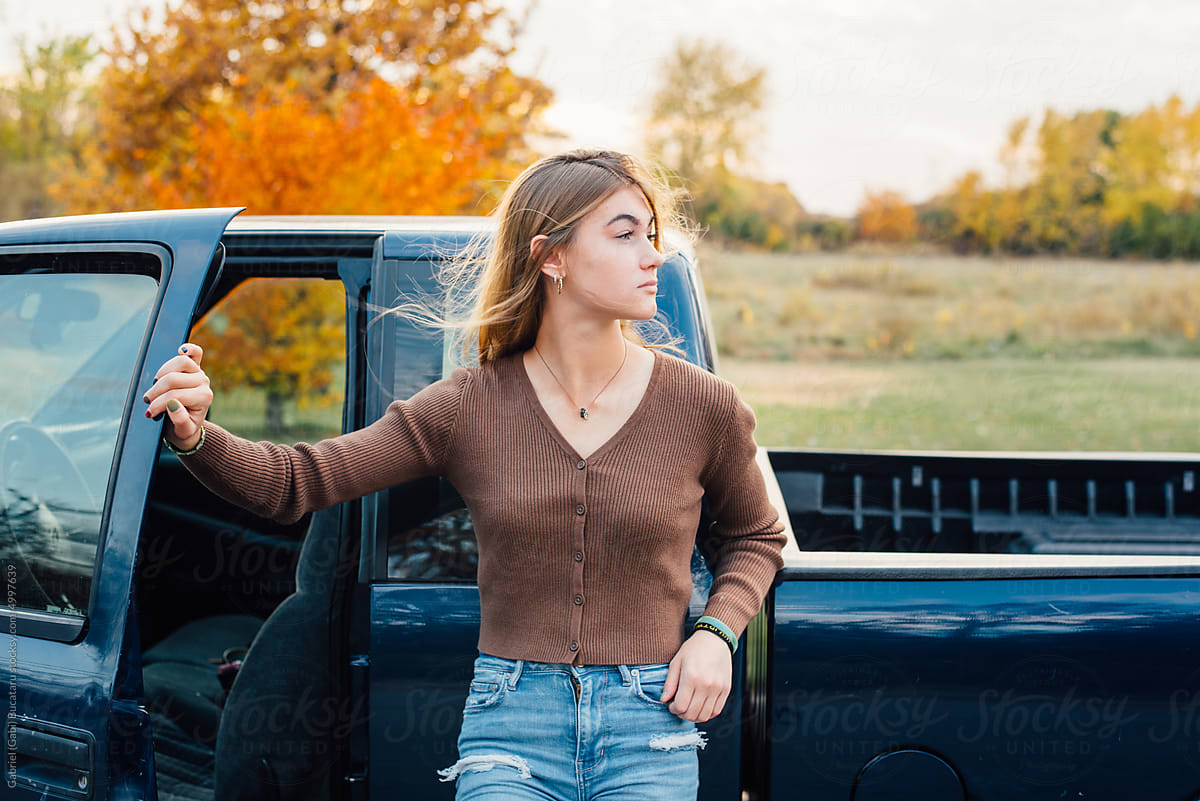Teenage girl and truck
