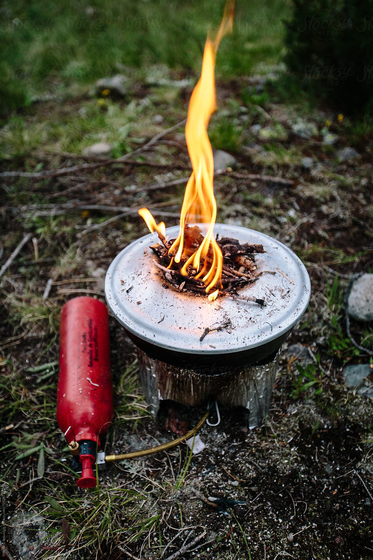 Camp stove with fire for backcountry baking outdoors