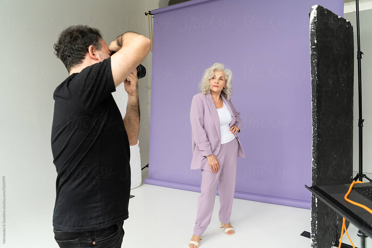 Modern Senior Woman Posing For Photographer