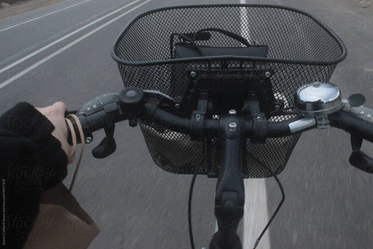 Traveling with a Black bicycle on the road
