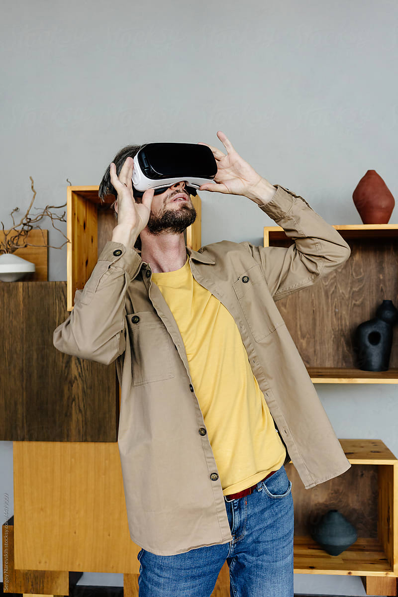 Man exploring virtual reality in glasses