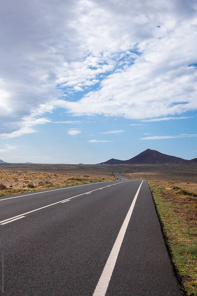 A sunlit road landscape in Lanzarote in the Canary Islands, Spain