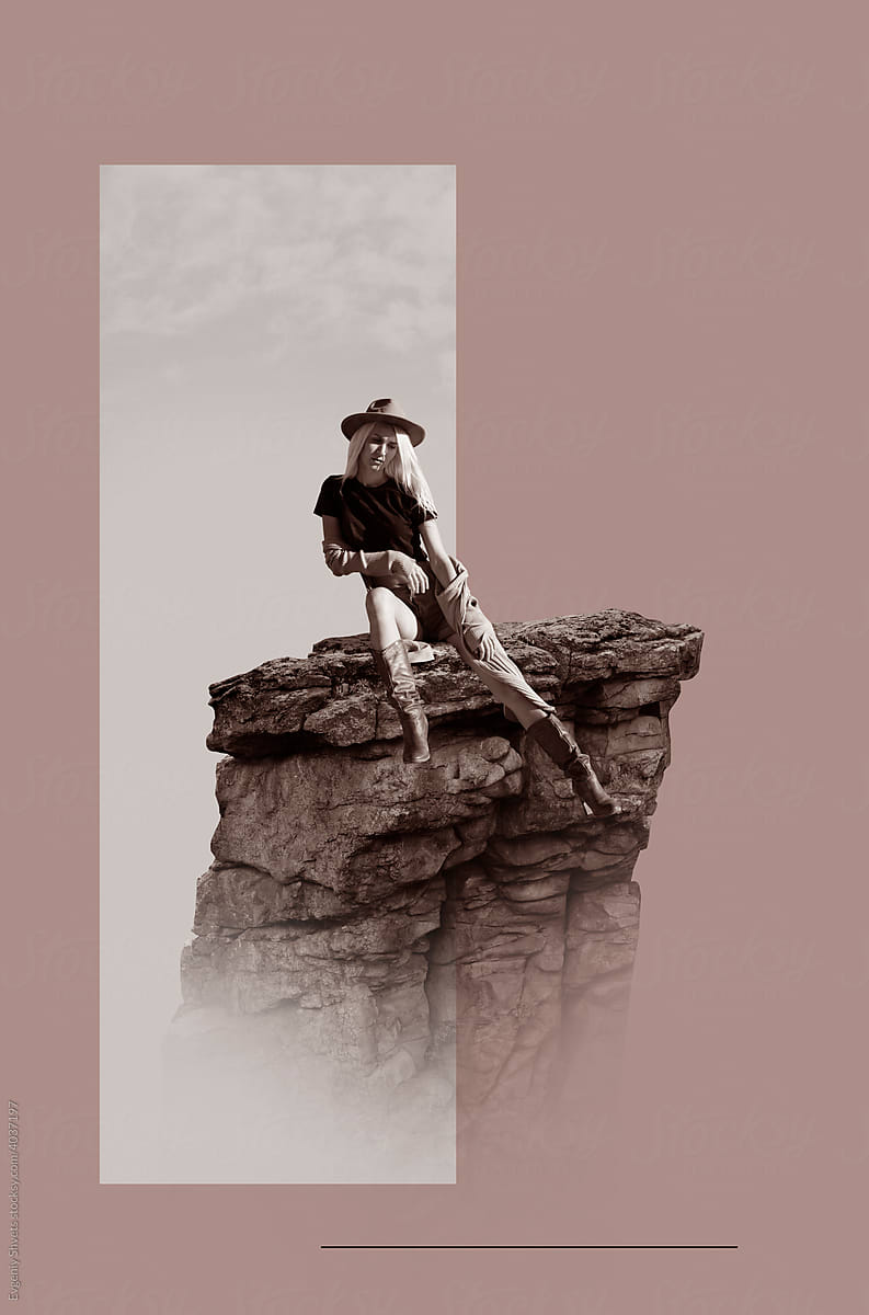 Woman in hat sitting on rock