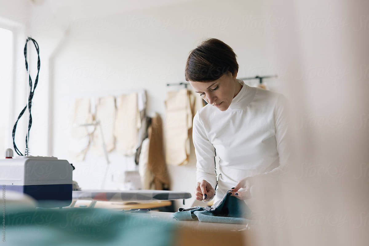 Stitching. Seamstress work. Fashion industry. Apparel making