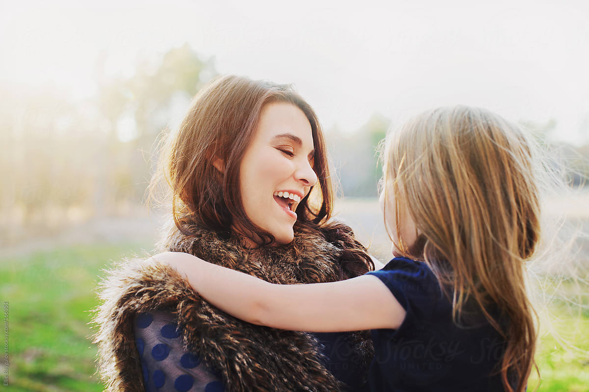 Mother And Daughter Sharing A Moment By Ellie Baygulov