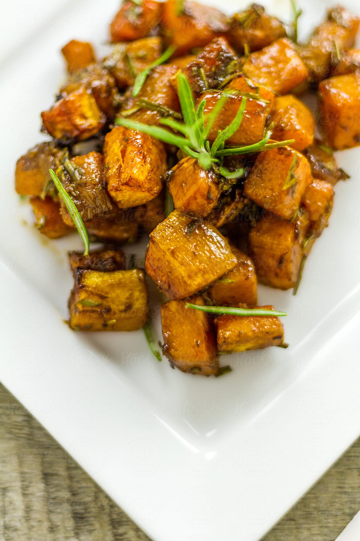 Roasted butternut squash on plate vertical
