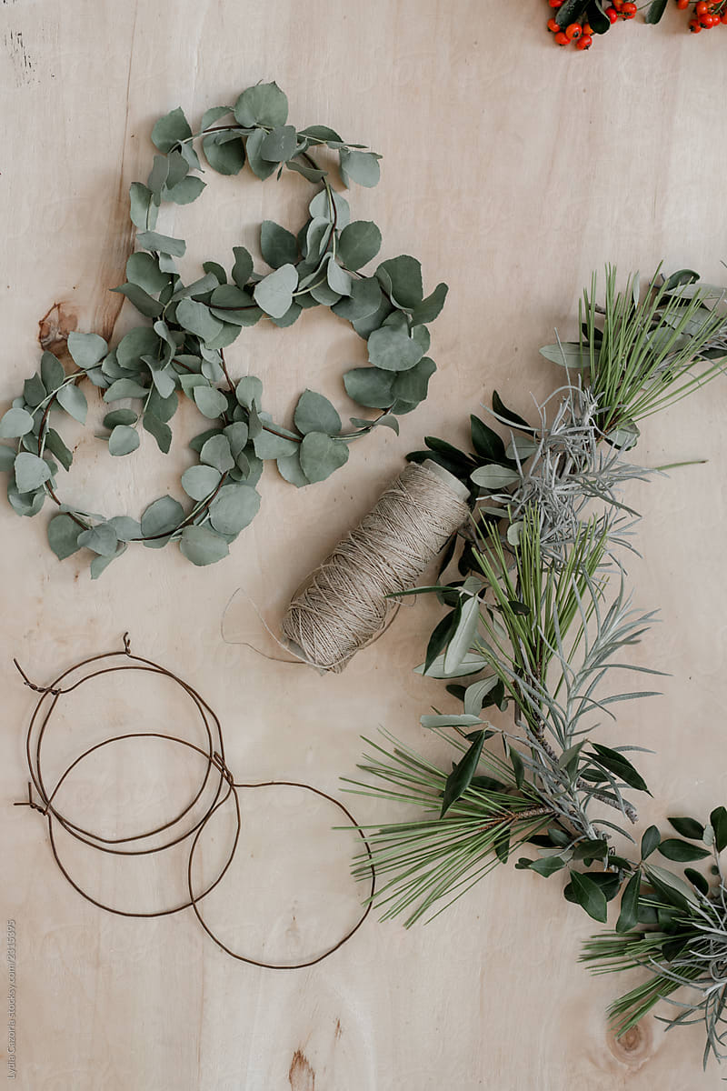 Making a Christmas wreath with branches and leaves