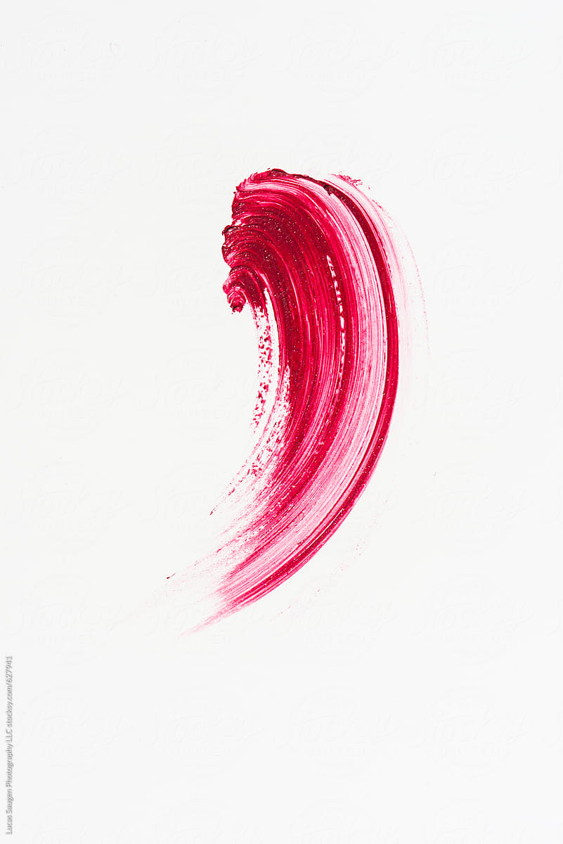 Lipstick smeared across a white surface.