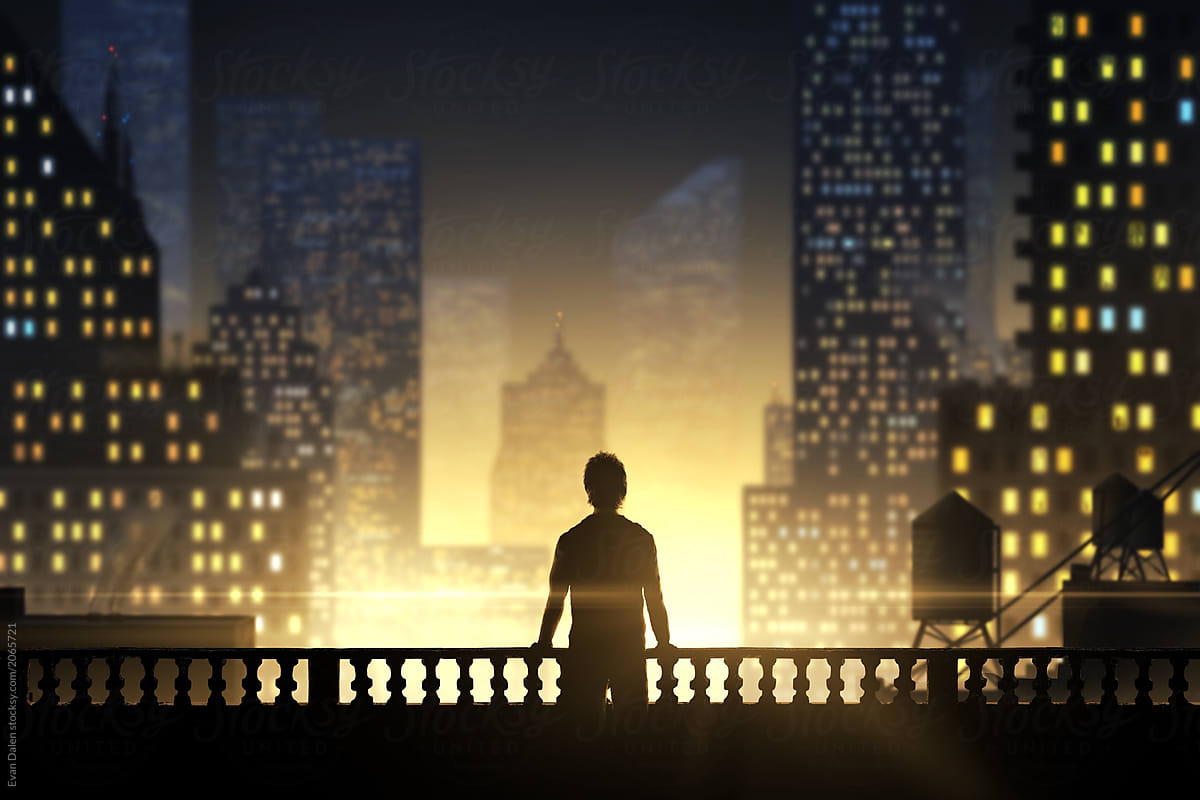 Man On Balcony Overlooking City By Evan Dalen Stocksy United