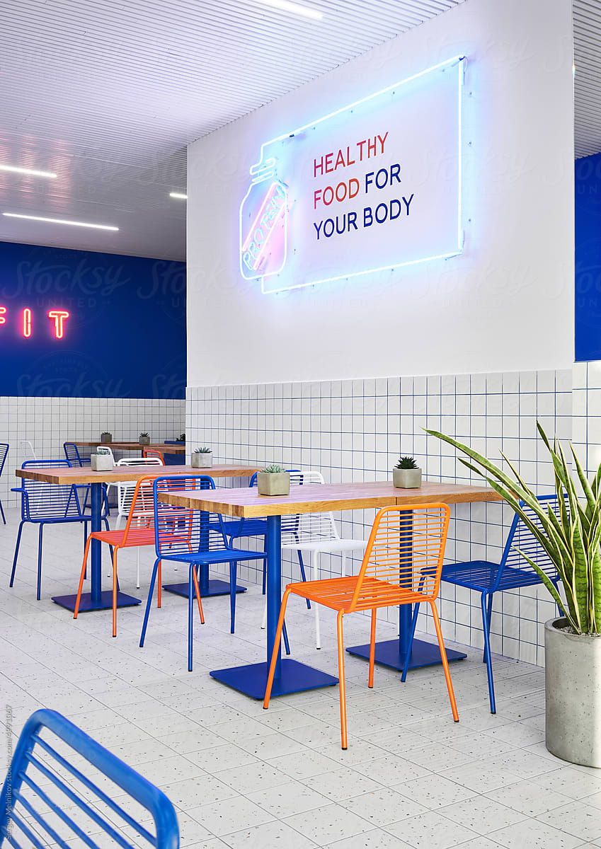 Modern cafe with neon, chairs and tables