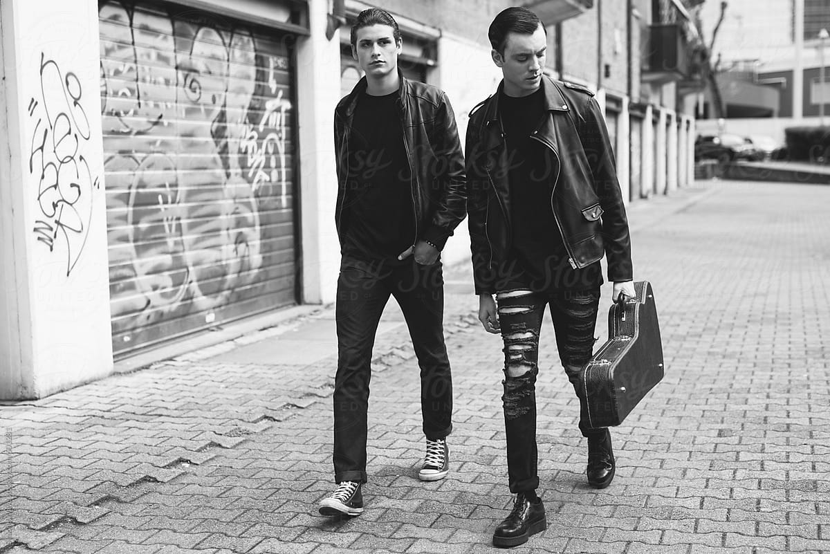 Young punk rockers walking in the street