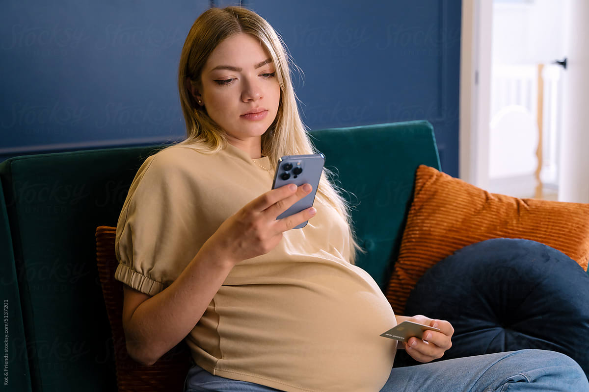 Calm Pregnant Woman Using Online Banking App