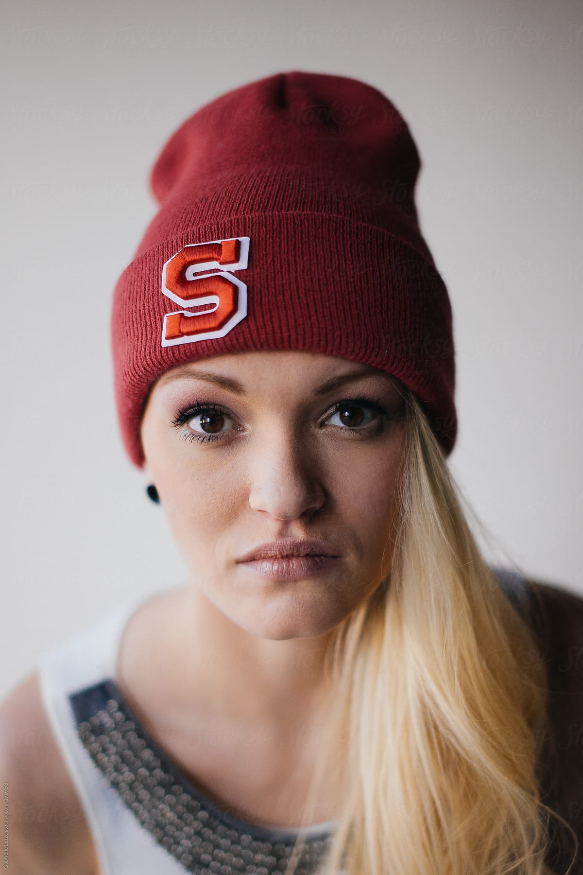 Closeup Of Pretty Blond Woman In A Beanie By Gabrielle Lutze 