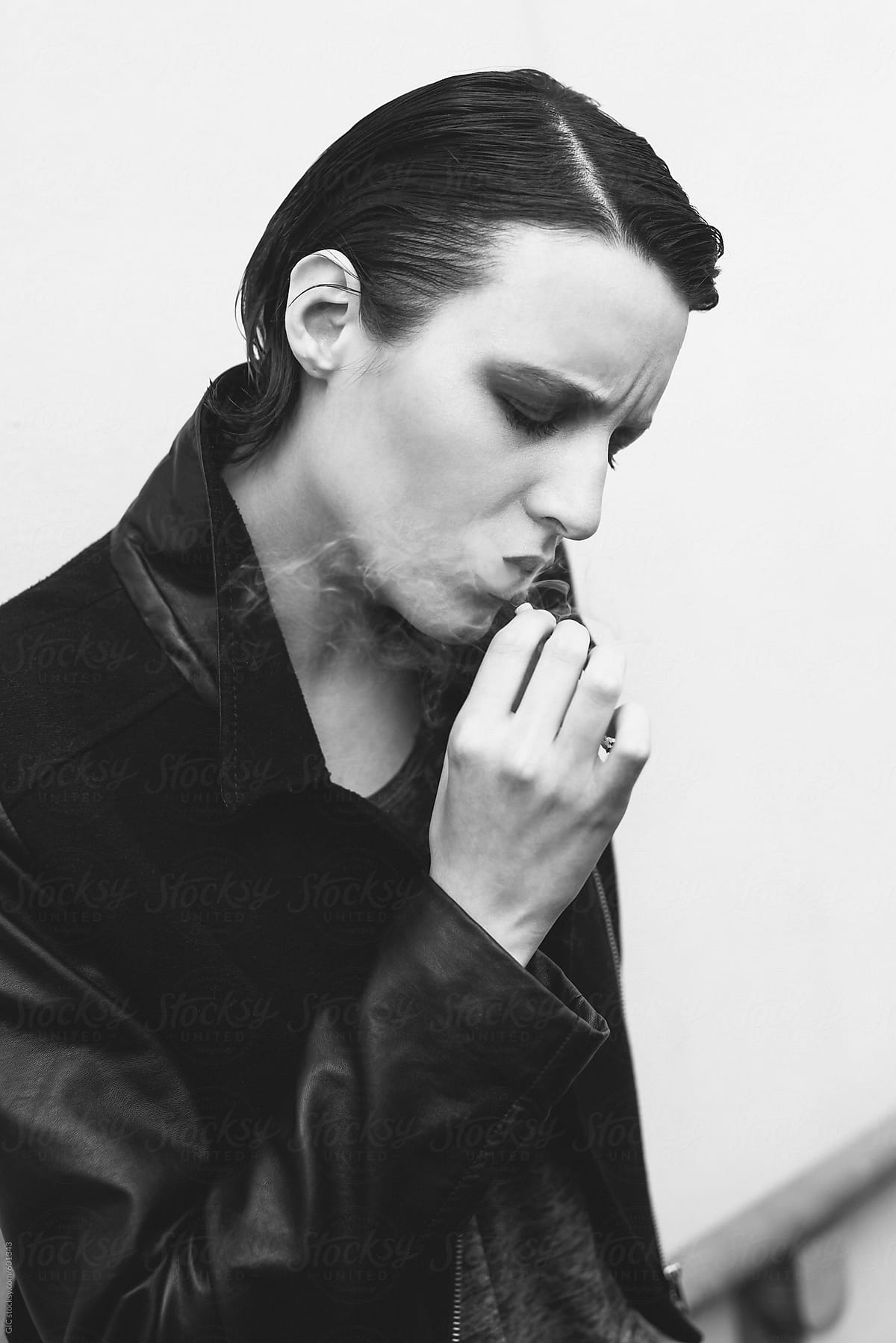 Young Punk Rocker Smoking A Cigarette By Stocksy Contributor Simone