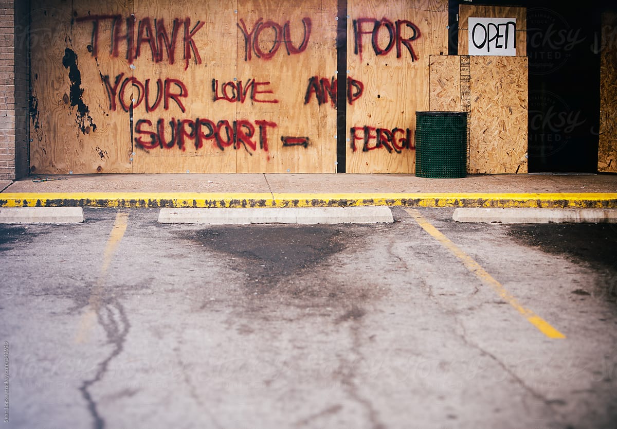 Ferguson: Damaged Market Storefront Boarded Up With Message Of Thanks