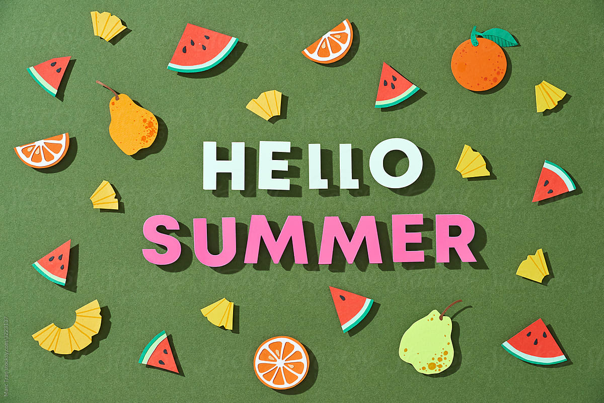 Word Hello Summer over tropical paper cut leaves