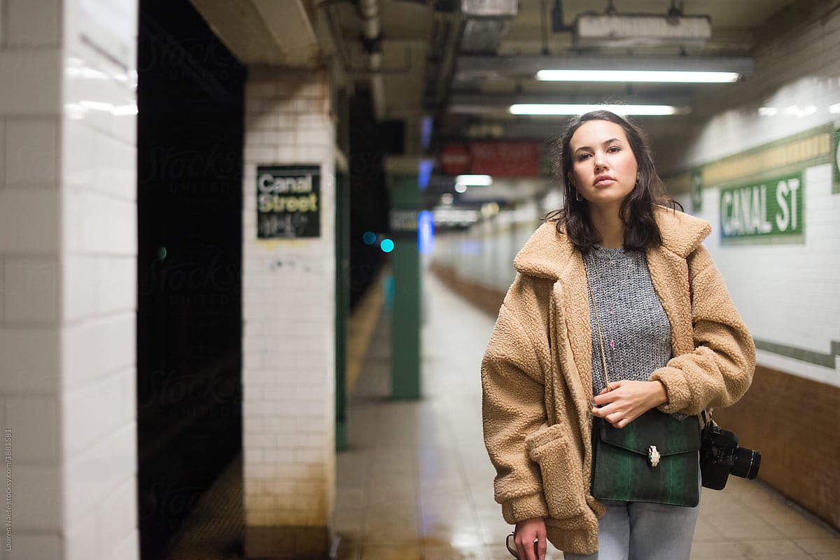 Young woman in subway station