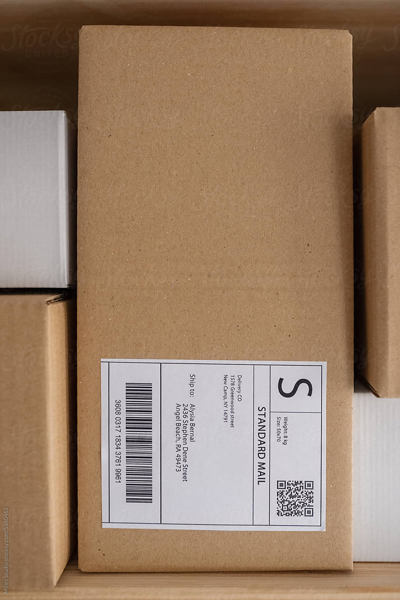 Rectangular box with address label on shelf