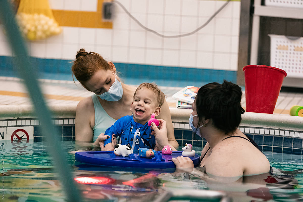Boy With Cerebral Palsy At Pool Therapy