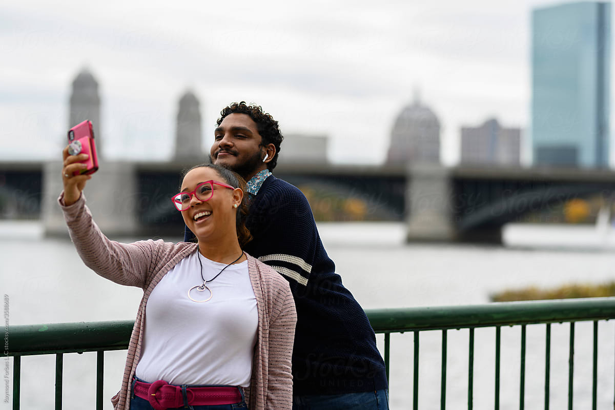 Young African American Couple Taking selfie on iphone