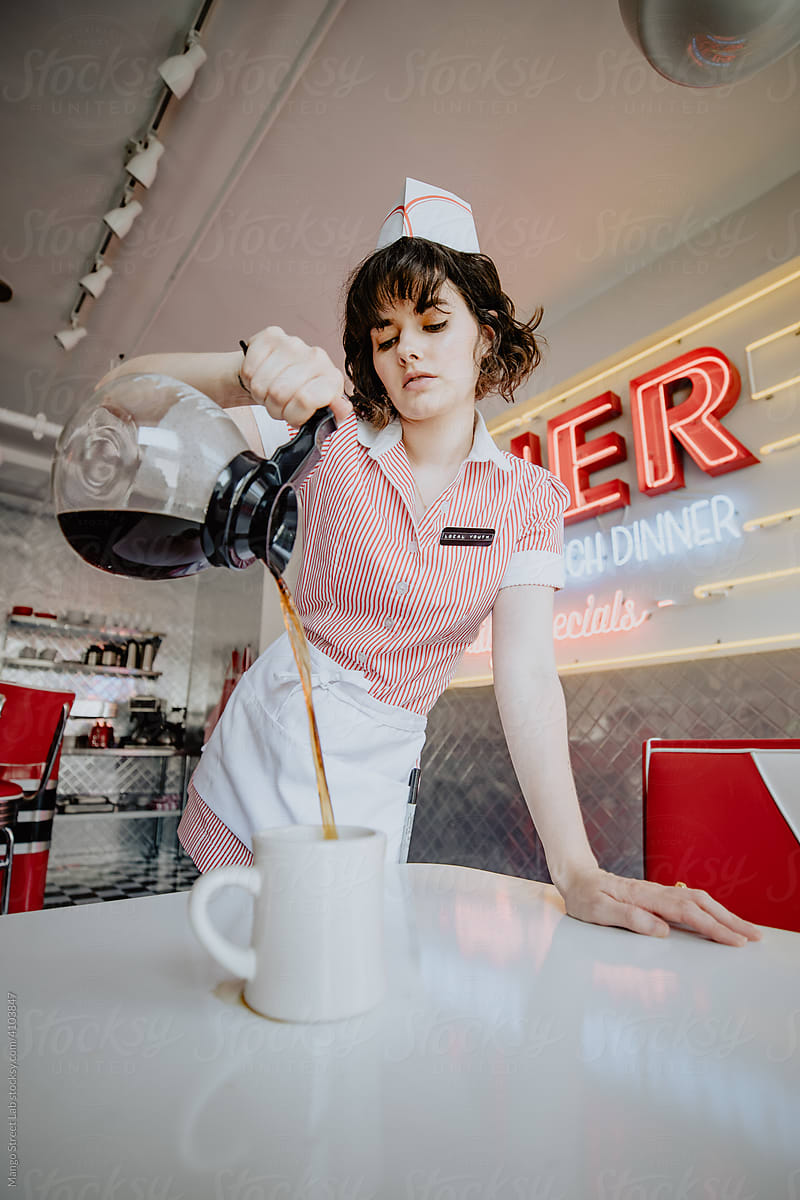 Waitress Pouring Coffee in 1950s Diner