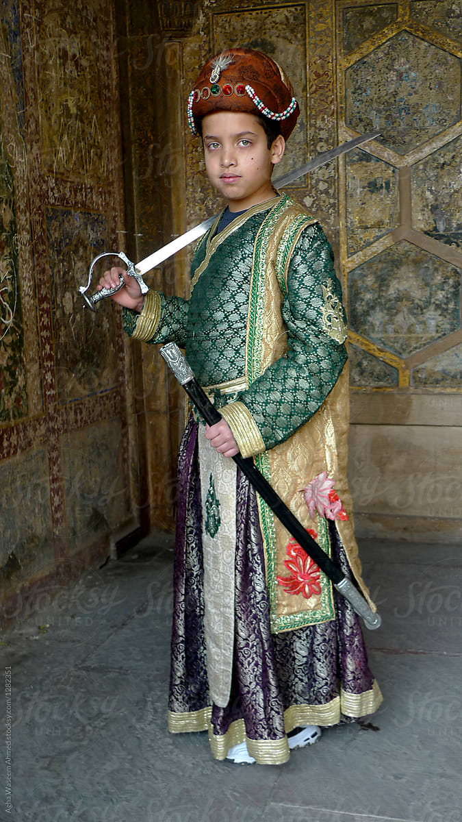 A boy dressed as a Mughal Prince