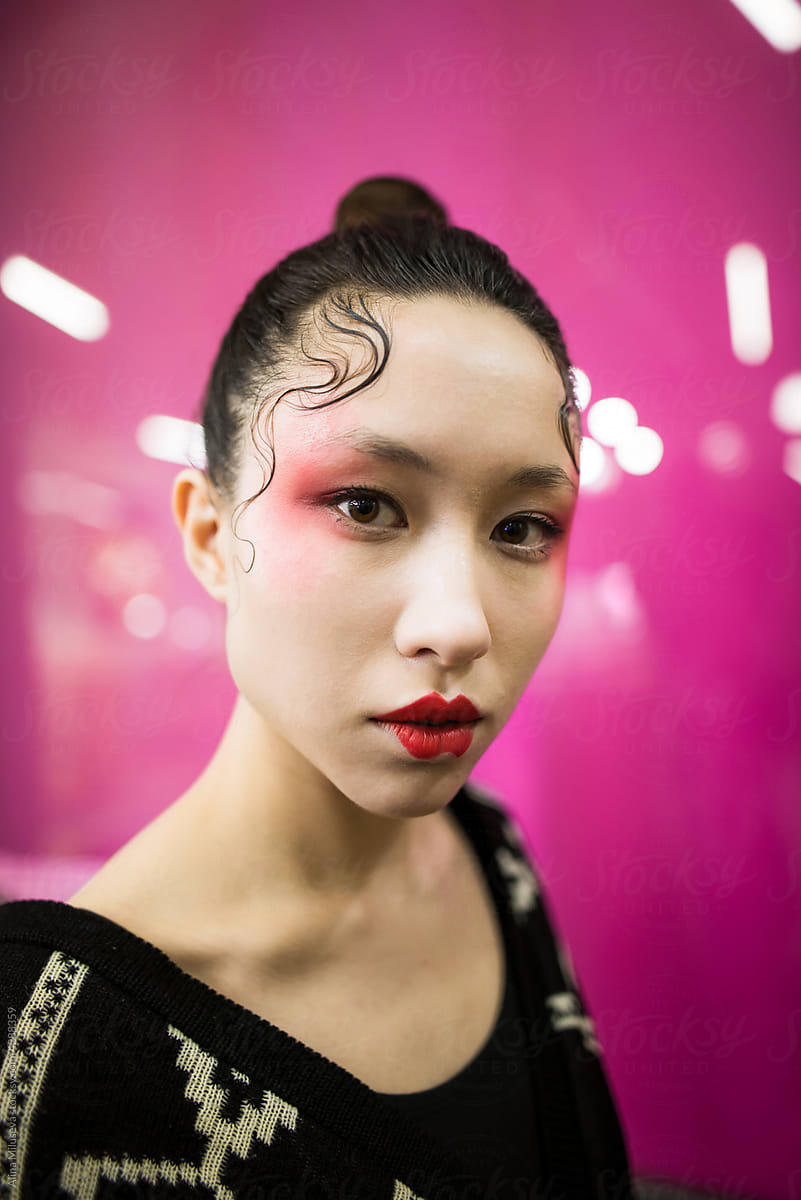Portrait of fashionable woman with geisha make up