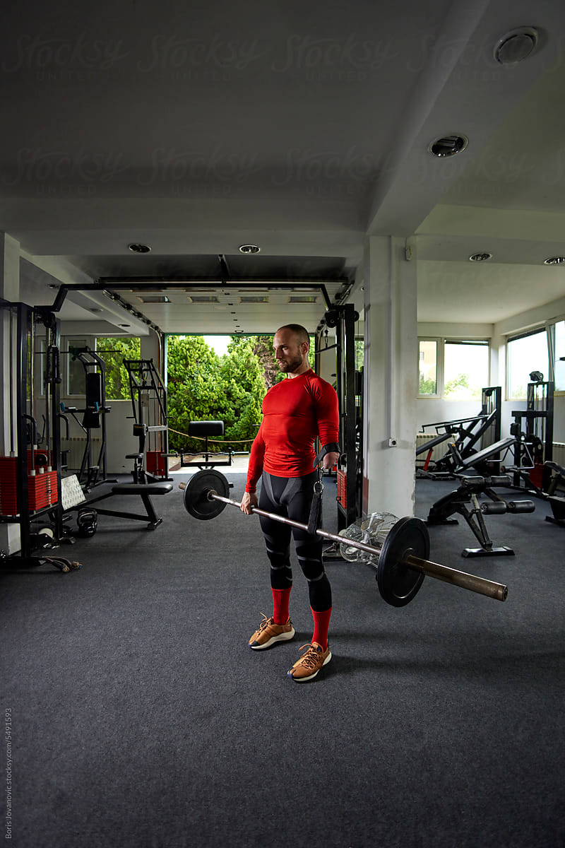 Wide portrait of a man in the gym