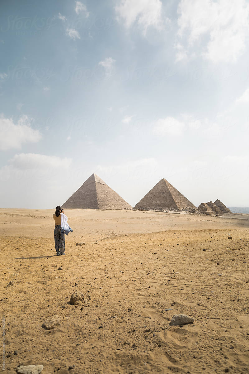 Female photographer at the pyramids of Egypt