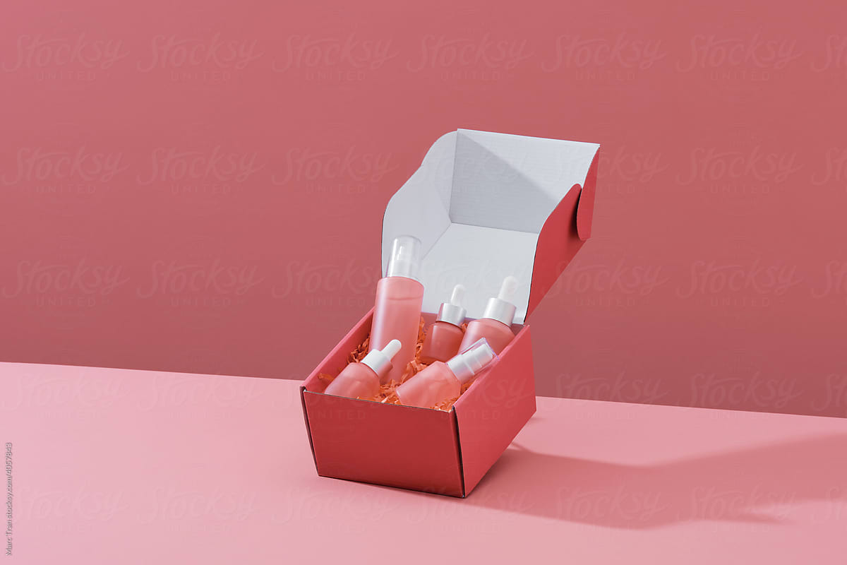 Set of cosmetics in a square red box