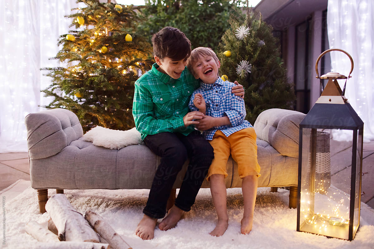Kids laughing at Christmas outdoors