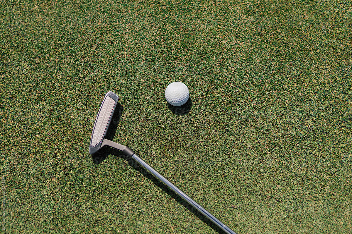 Above Shot Of A Golf Stick And Golf all On The Green Field