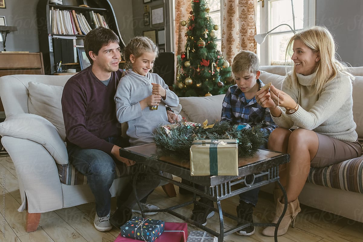 Family Preparing For Christmas Holiday