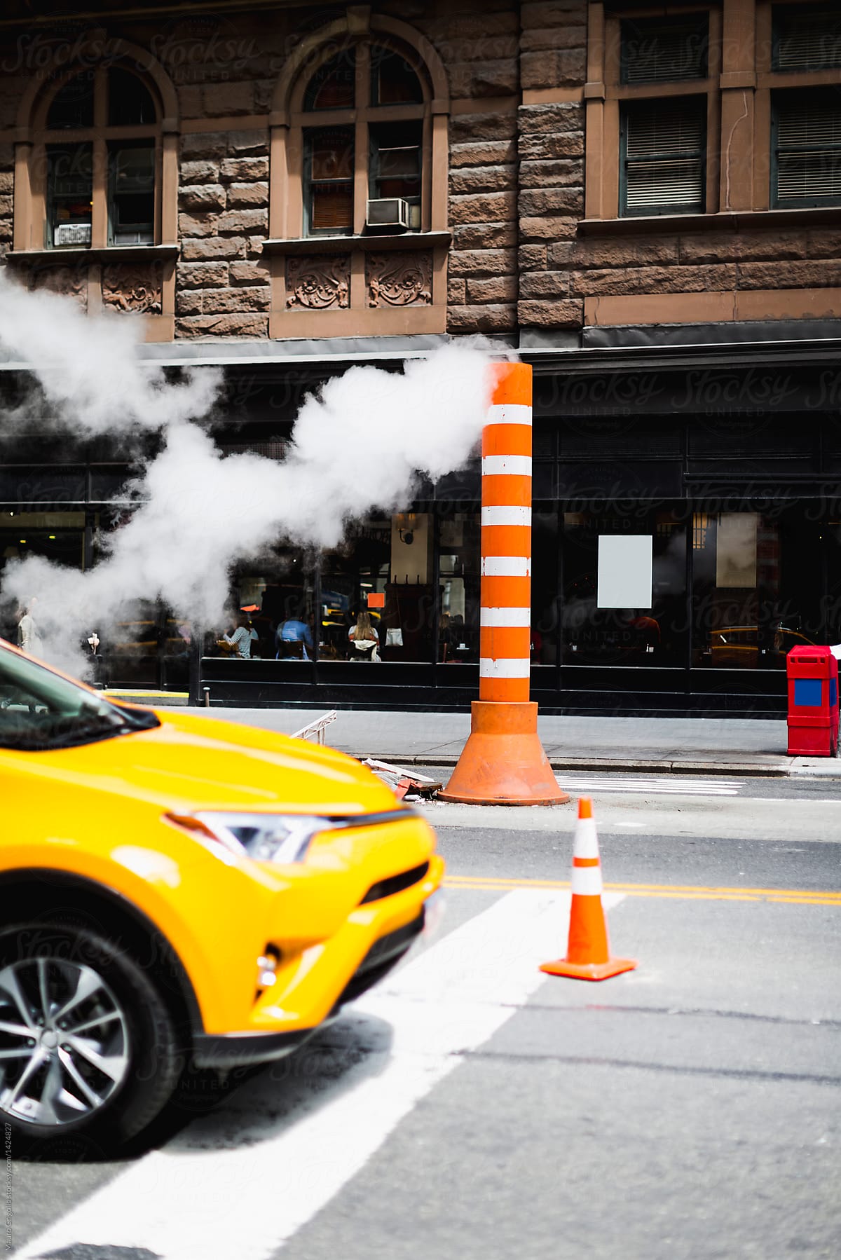 Yellow car on a street in Manhattan, New York City