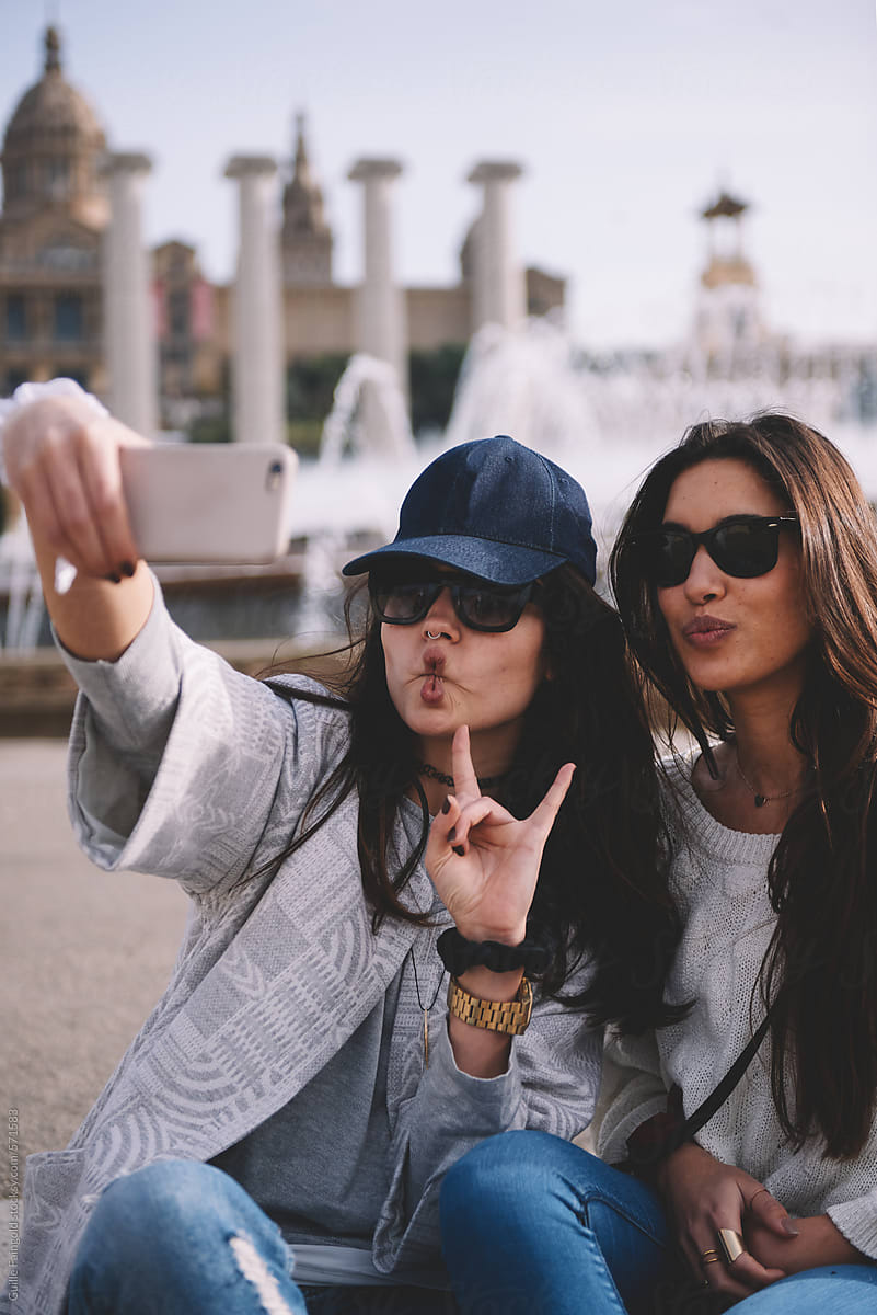 Girls making faces for selfie